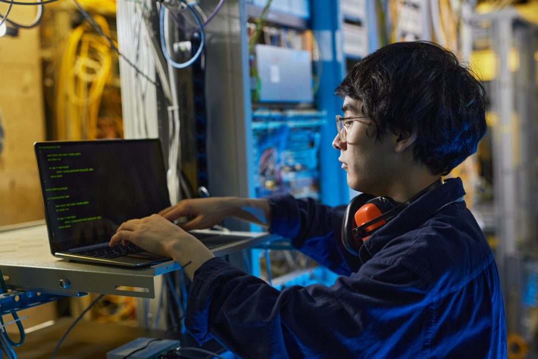 young man programming server - Motion Star Lab